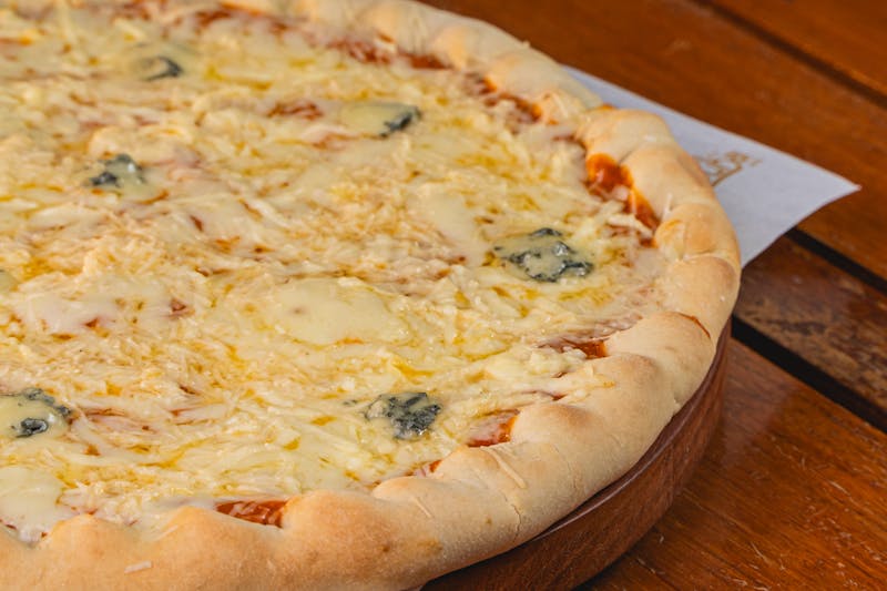 Four Cheese classic pizza with mozzarella, gorgonzola, fontina and parmesan