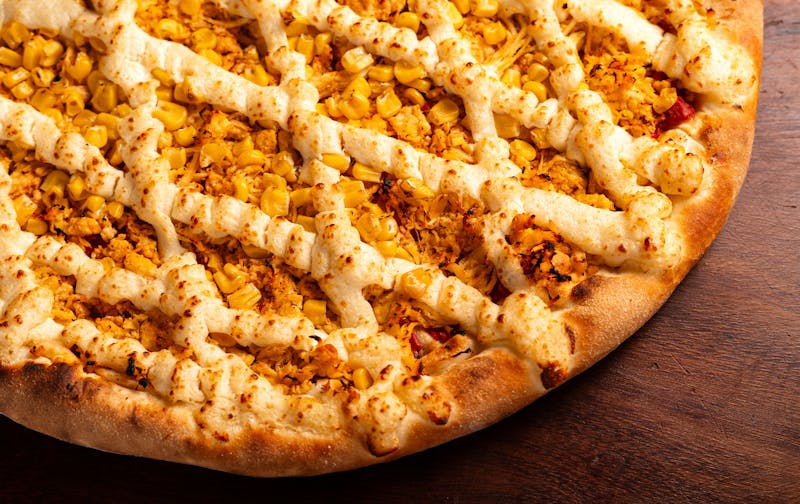 BBQ Chicken Punch pizza with smoky barbecue sauce
